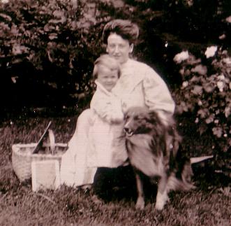 Rose Drueke and Irene with dog and roses